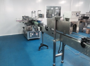 Rubber cap shrinking machine
